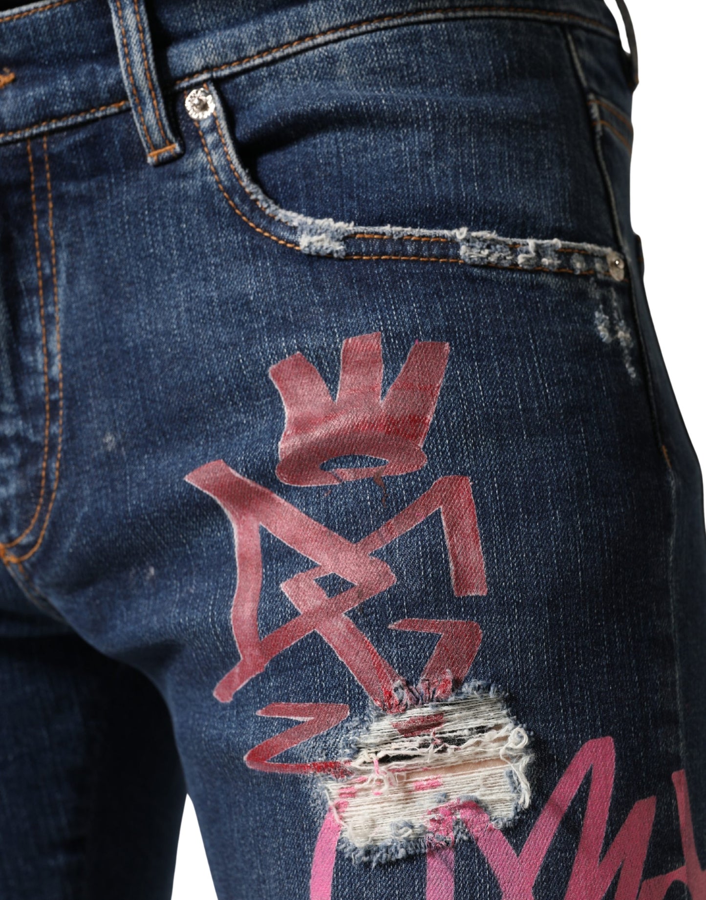 Jean skinny bleu délavé à imprimé graffiti Dolce & Gabbana