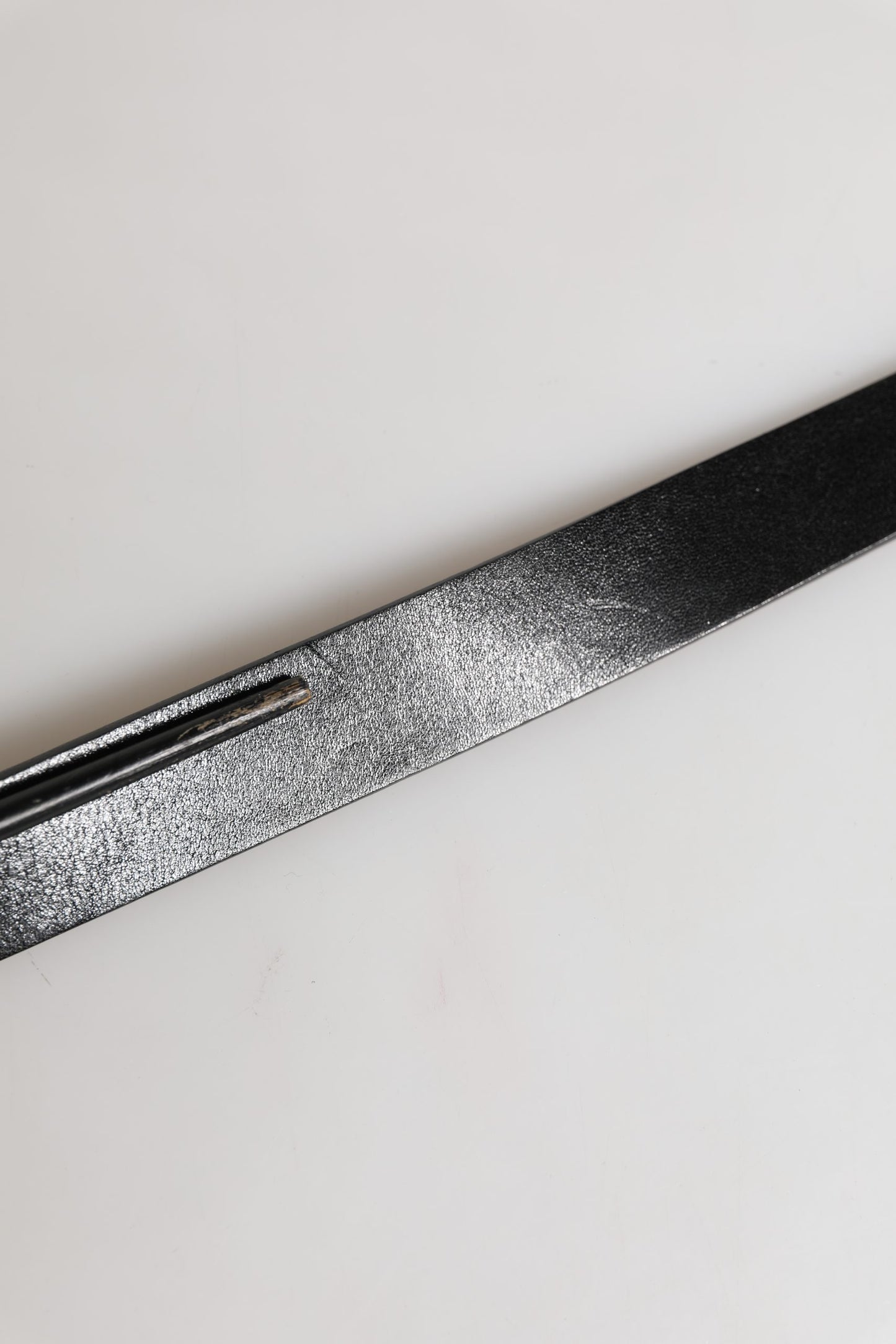Ceinture Dolce & Gabbana pour homme, en cuir noir classique avec boucle logo.