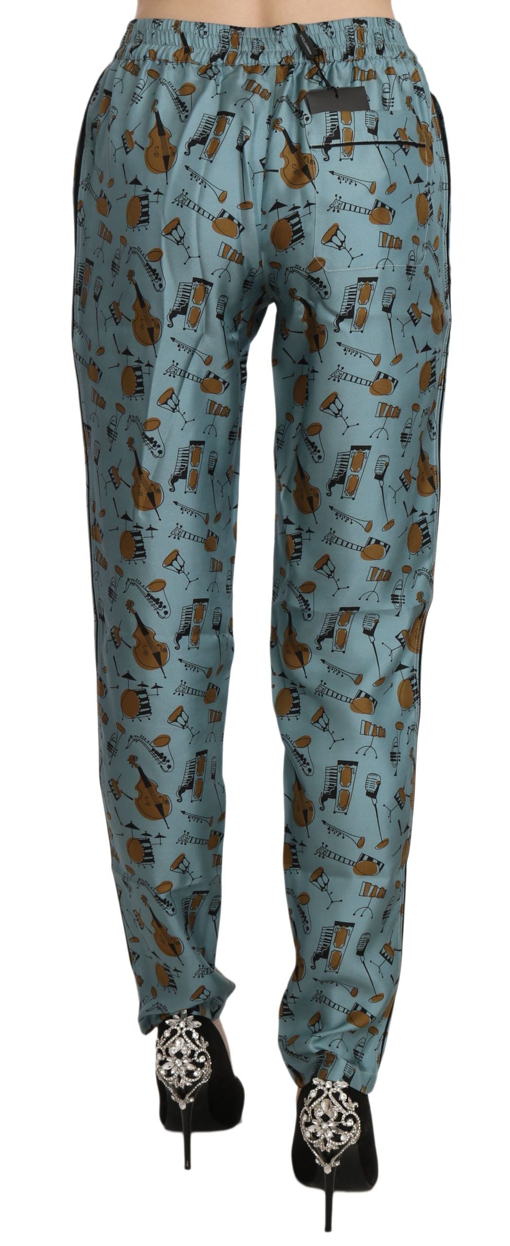 Pantalon fuselé à imprimé d'instruments de musique bleu de Dolce & Gabbana