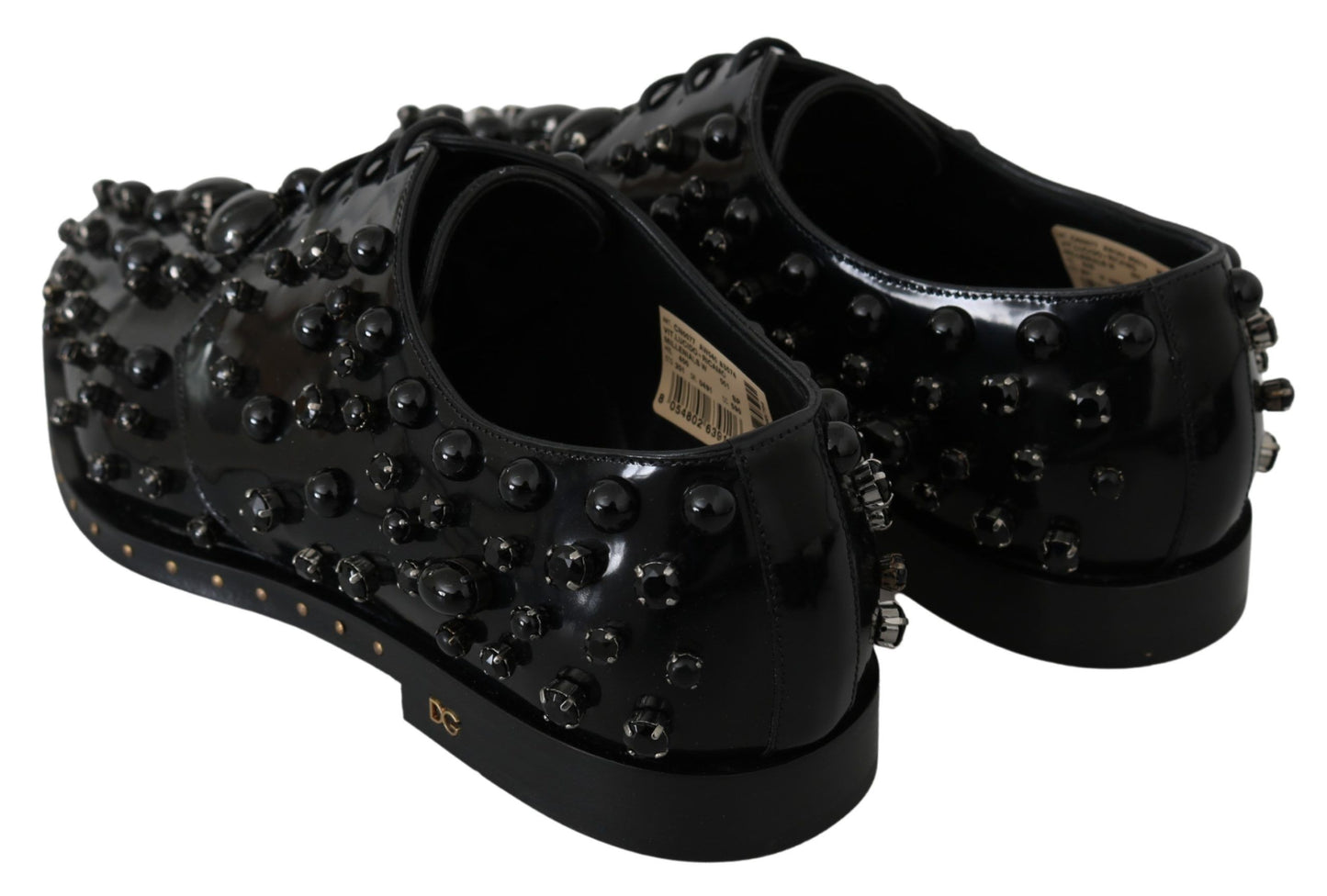 Dolce & Gabbana leren schoenen met kristallen en brogue-details in het zwart.