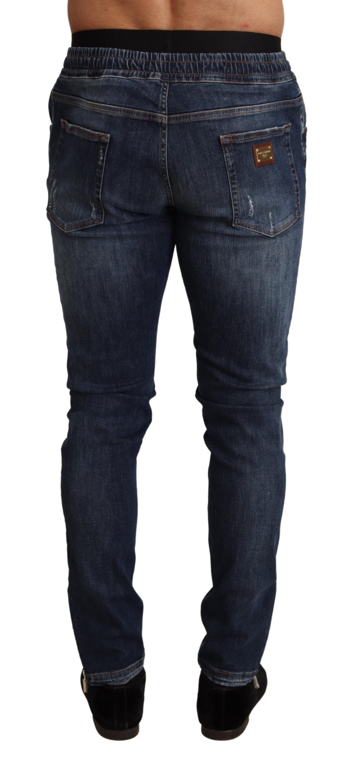Jeans en jean bleu en coton extensible et délavé de Dolce & Gabbana