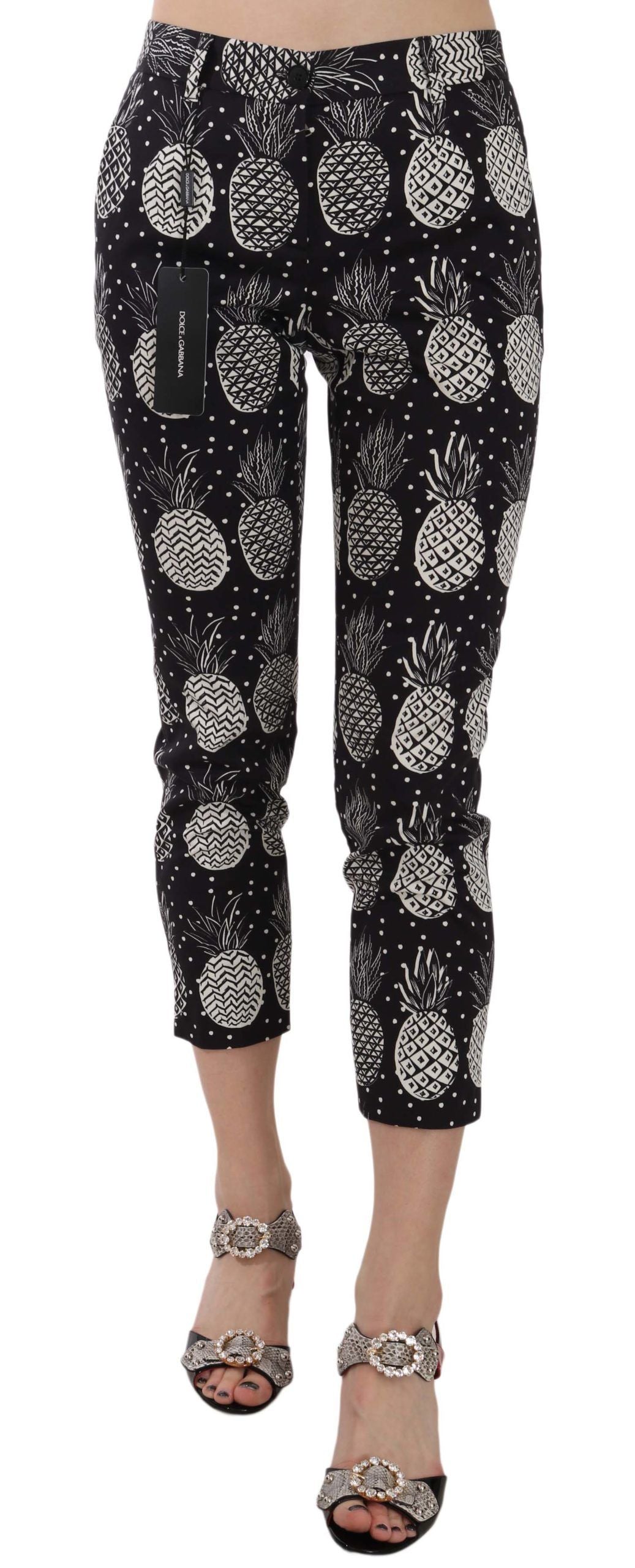 Dolce & Gabbana zwarte, aansluitende capri broek met ananasprint.