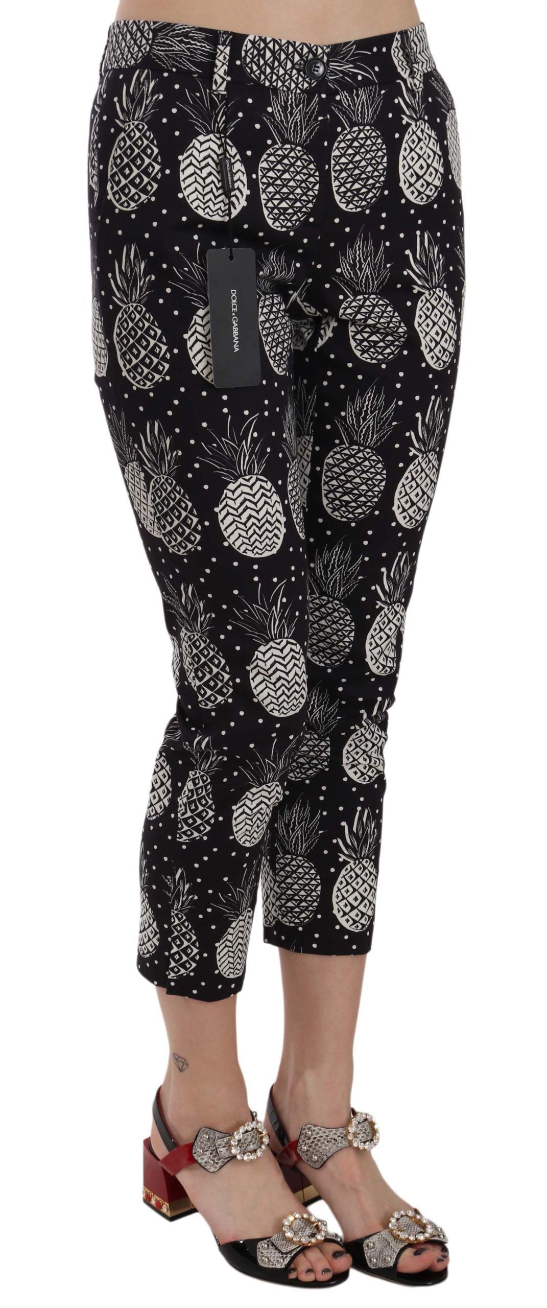 Dolce & Gabbana zwarte, aansluitende capri broek met ananasprint.