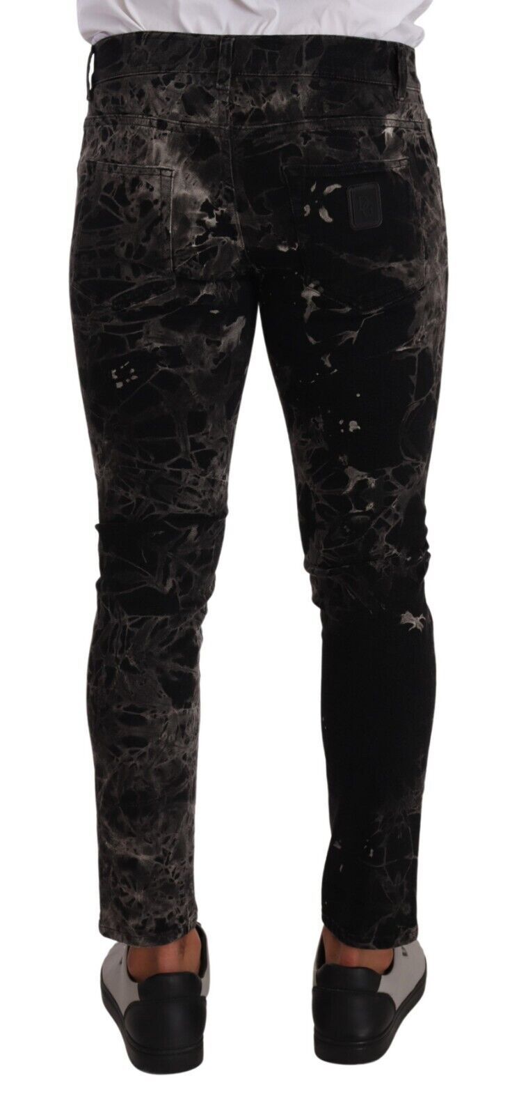 Jeans slim à coupe ajustée à motifs noirs de Dolce & Gabbana
