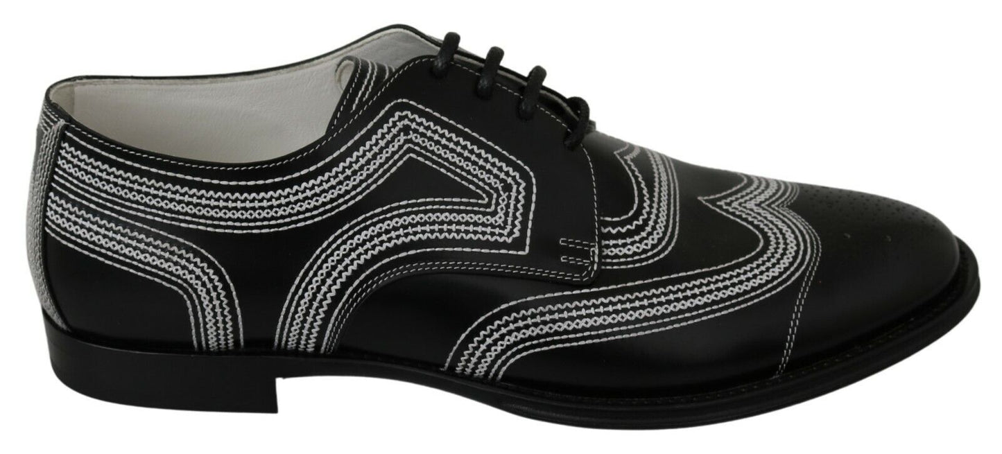 Chaussures habillées en cuir noir, style derby, avec lacets blancs de Dolce & Gabbana.