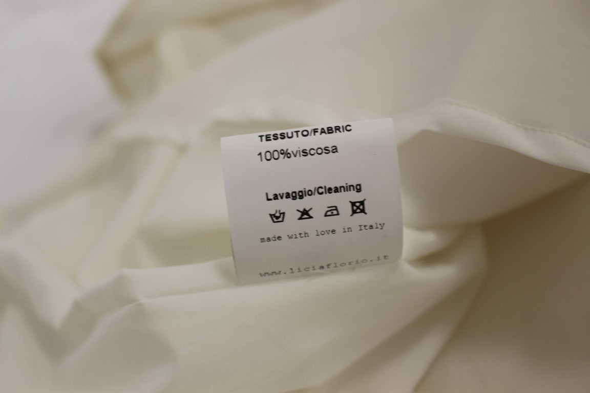 Liccia Florio Robe de thé blanche à col halter, longueur genou