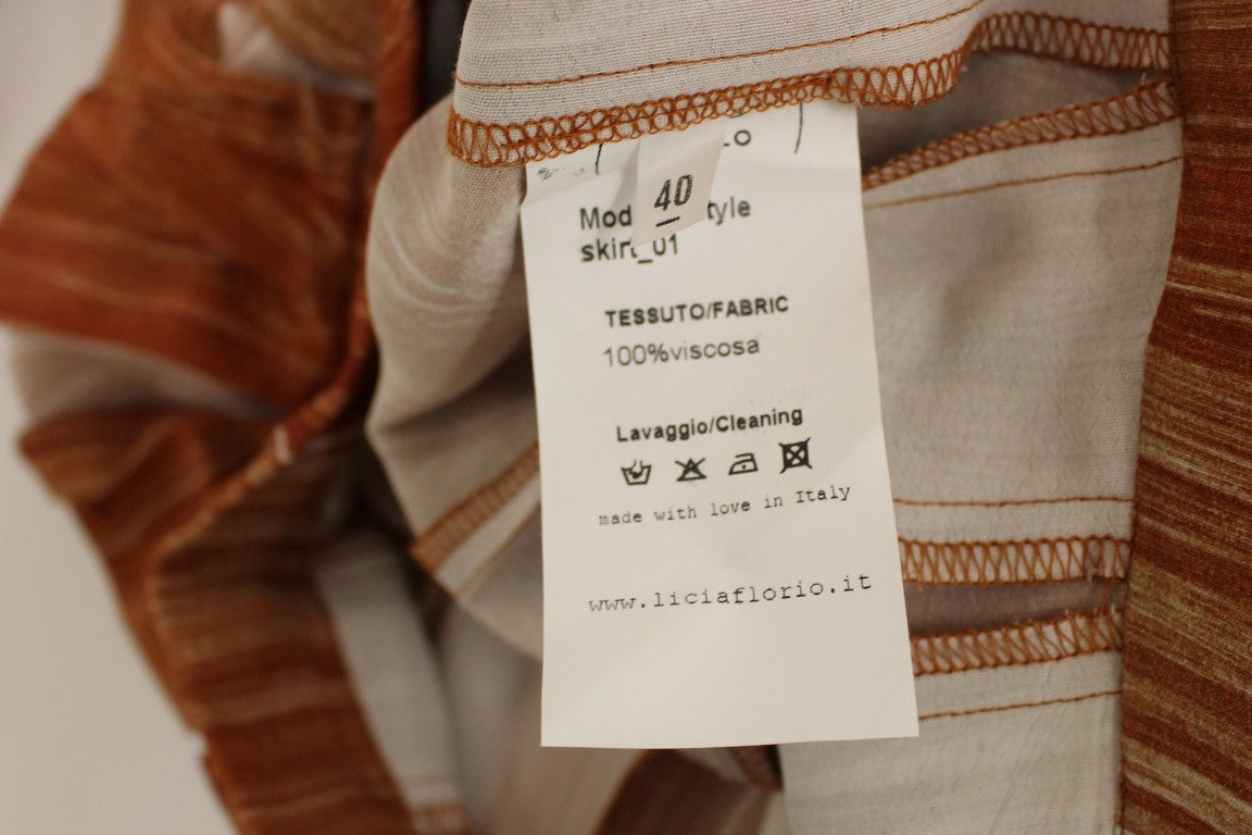 Jupe longue marron et orange de Licia Florio, longueur sous le genou.
