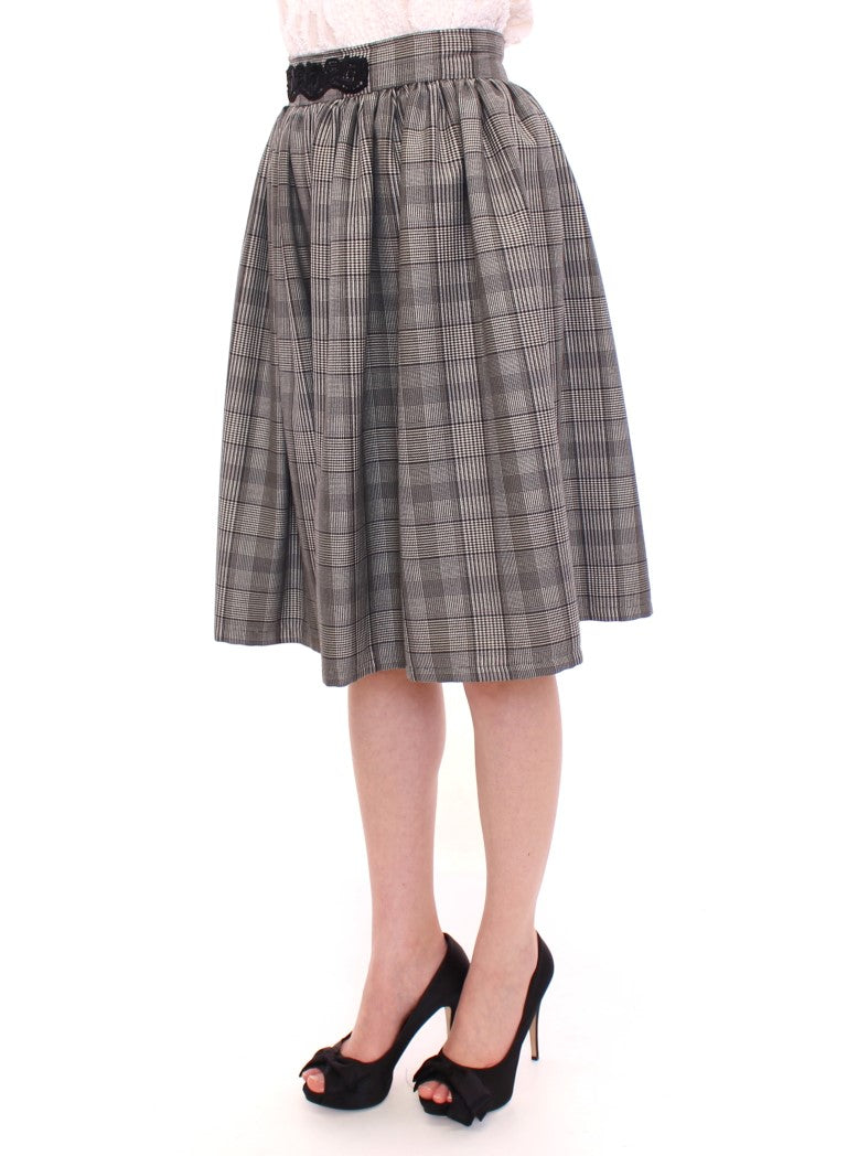 NOEMI ALEMÁN Jupe-short en laine grise à carreaux