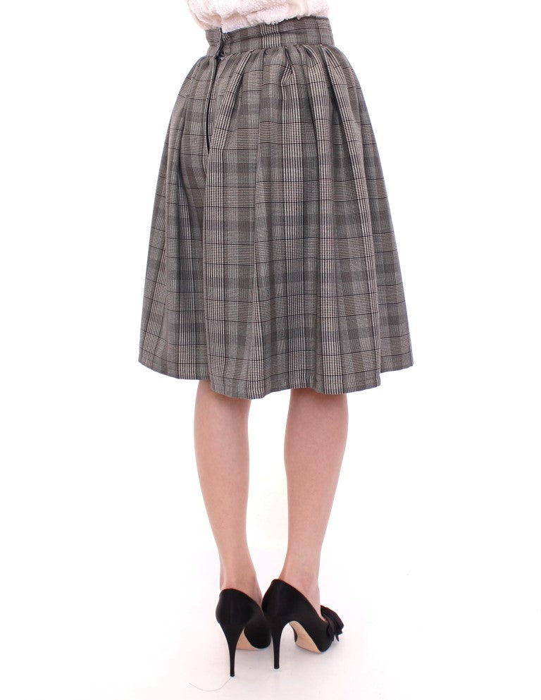 NOEMI ALEMÁN Jupe-short en laine grise à carreaux