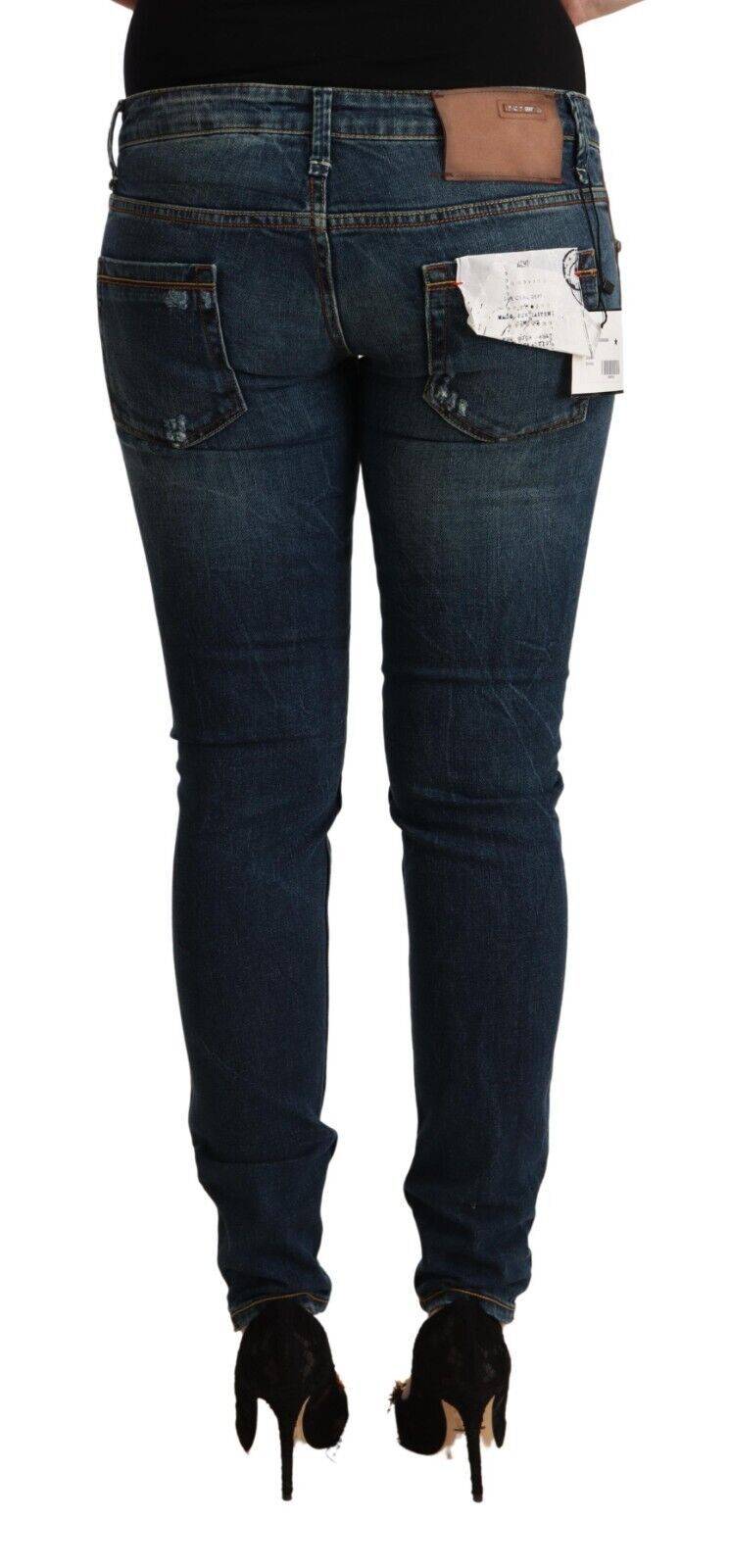 Acht blauw gewassen, smalle, lage broekspijnen jeans