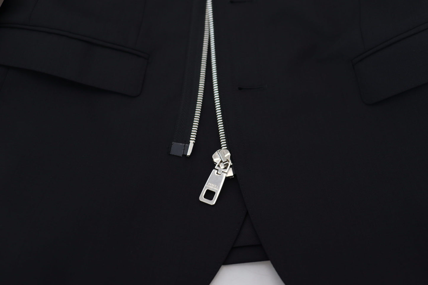 Dolce & Gabbana veste noire en laine à manches longues et fermeture éclair intégrale