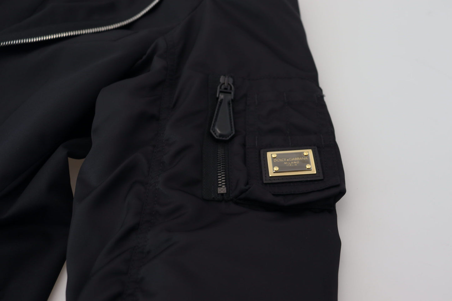 Dolce & Gabbana veste noire en laine à manches longues et fermeture éclair intégrale