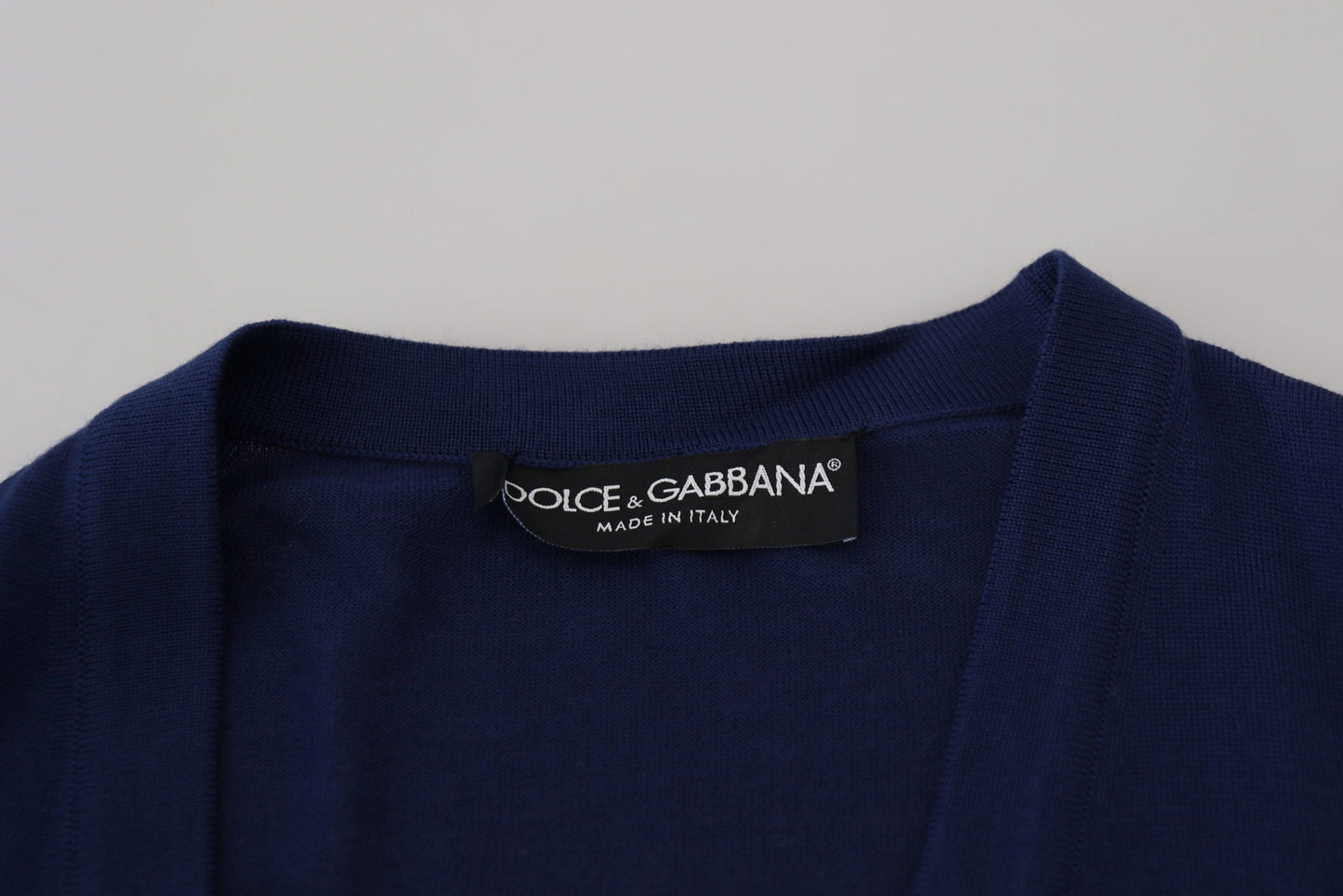 Cardigan en laine bleu à col en V et boutons de Dolce & Gabbana