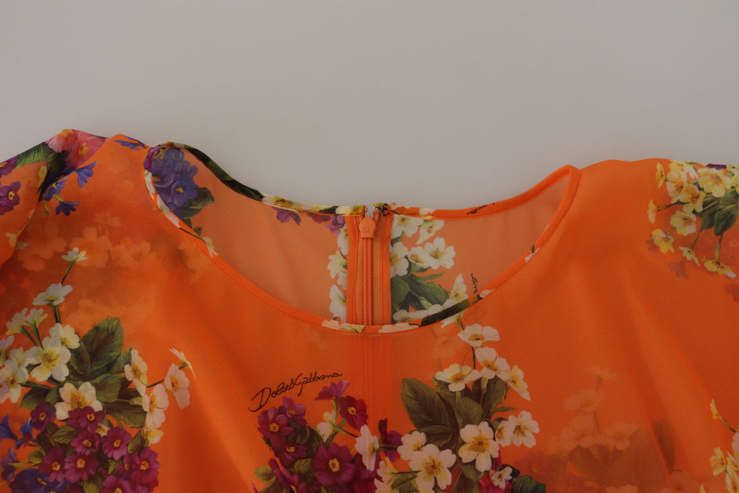 Dolce & Gabbana bloes met lange mouwen en oranje bloemenprint