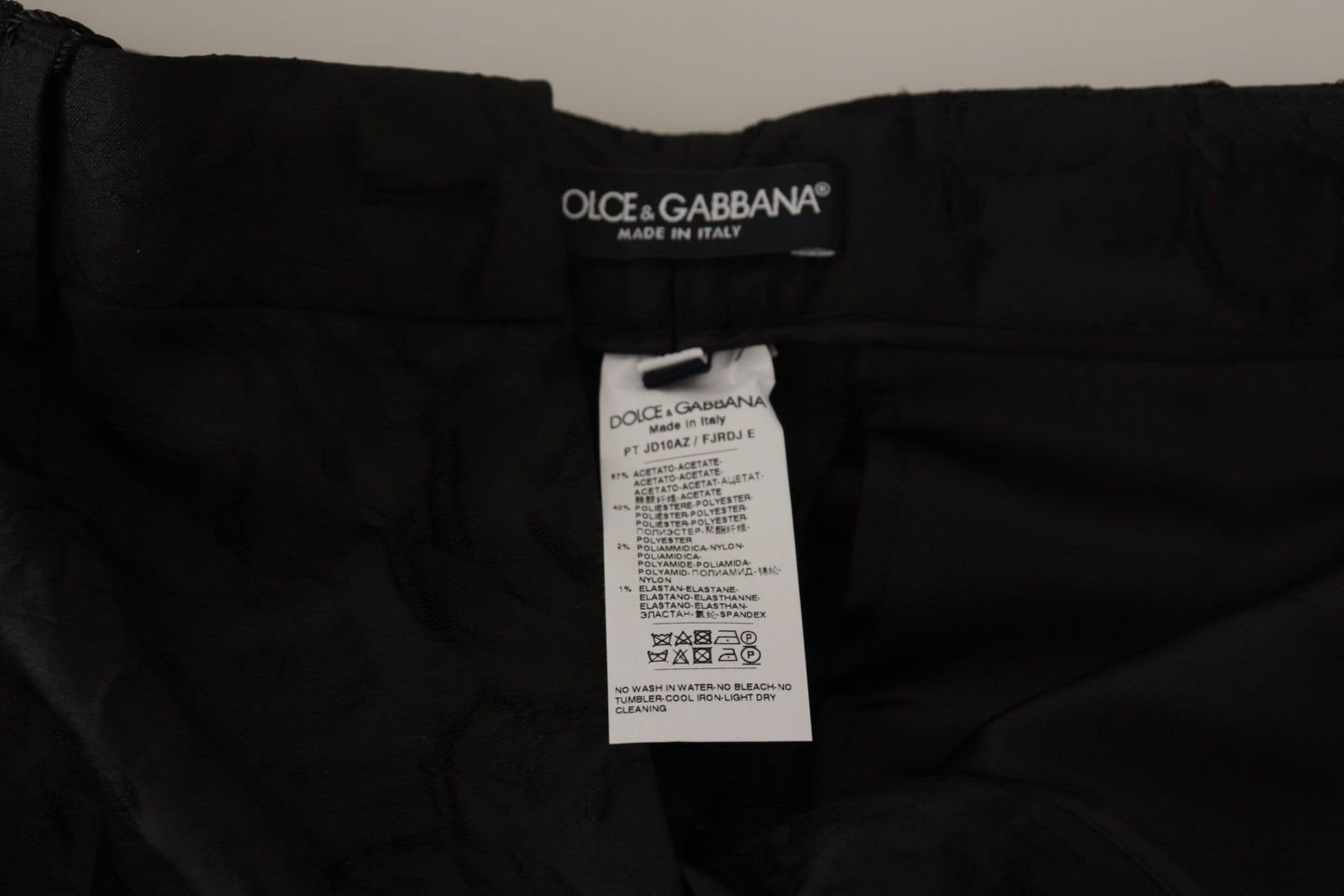 Dolce & Gabbana broek van brokaat in het zwart, cropped en met hoge taille.