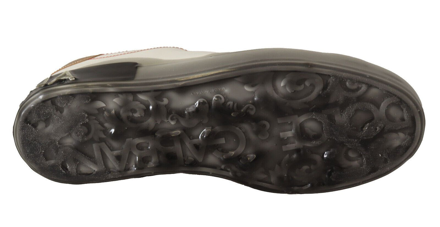 Sneakers basses en cuir blanc et or de Dolce & Gabbana, chaussures décontractées.