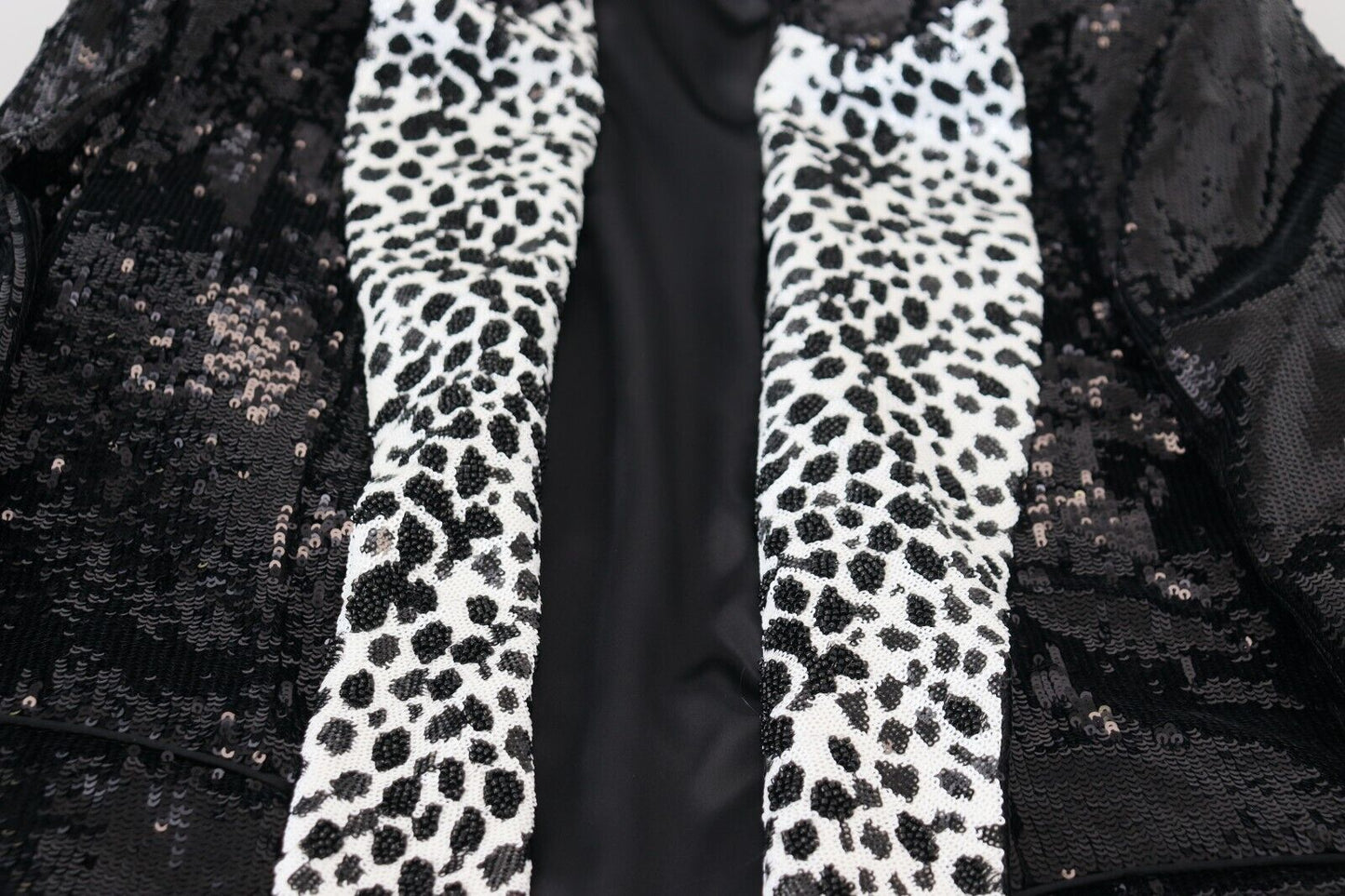 Blazer en nylon noir à paillettes et motif vache de Dolce & Gabbana