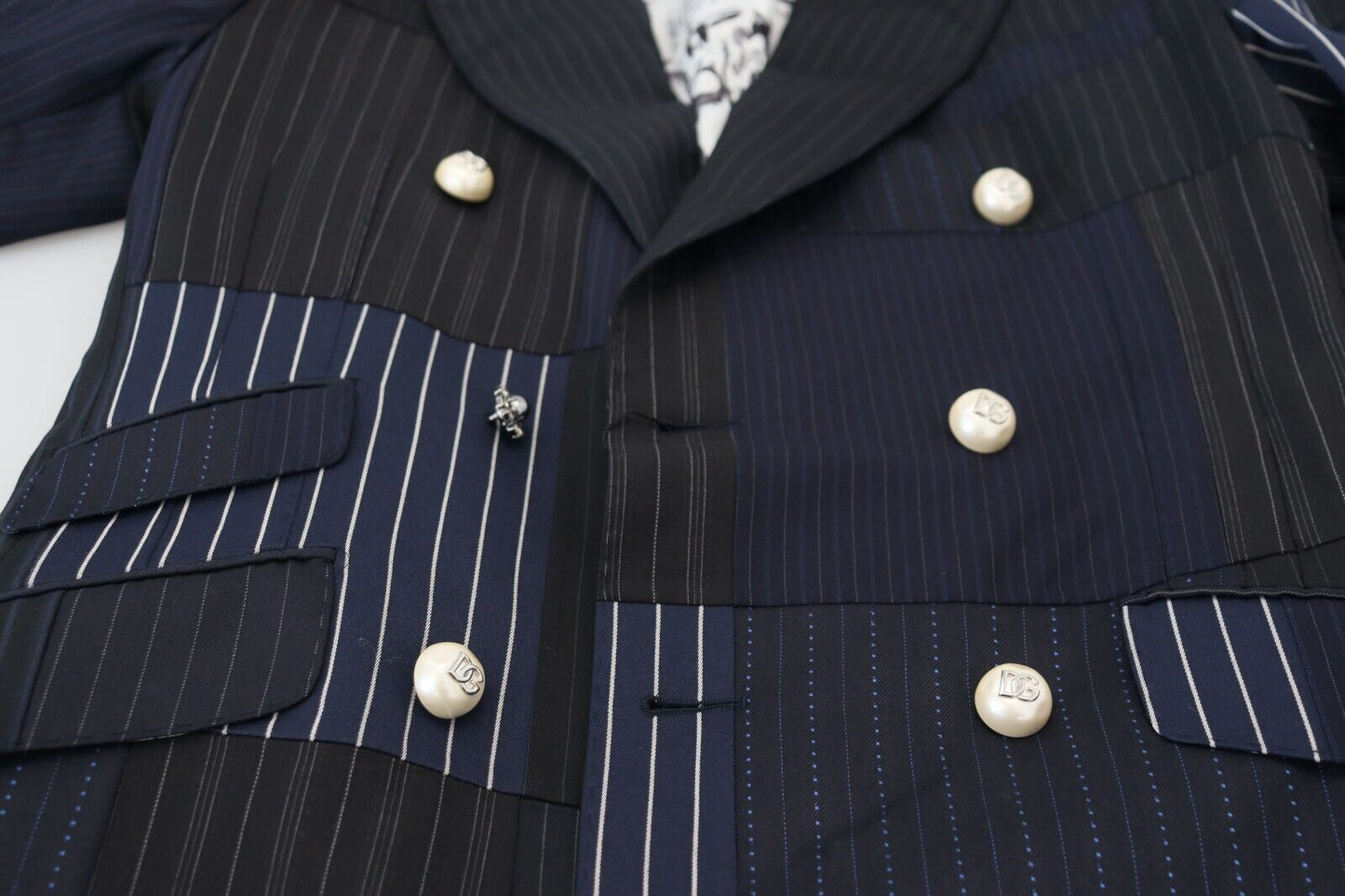 Dolce & Gabbana Blazer bleu en laine avec empiècements et boutonnage double.