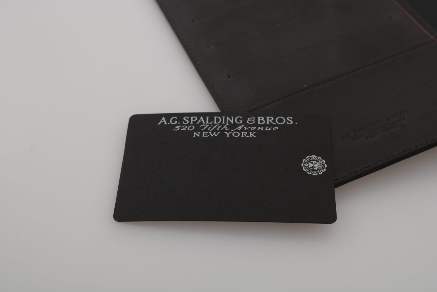 AG Spalding & Bros Zwarte leren bifold reistas met logo