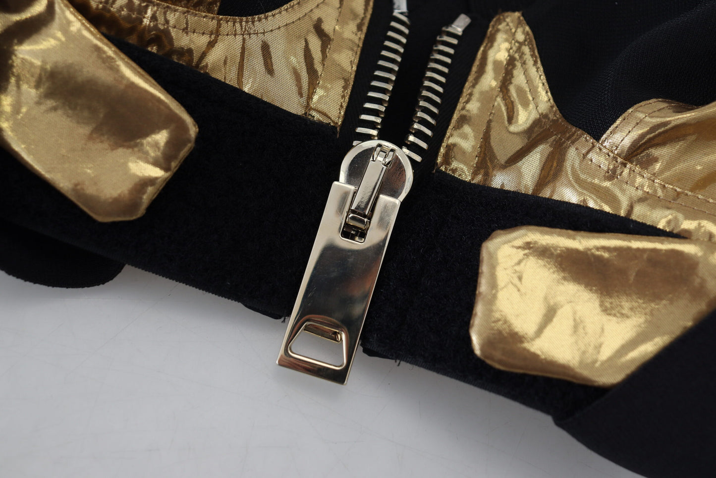 Haut bustier court sans manches Dolce & Gabbana en noir et or.