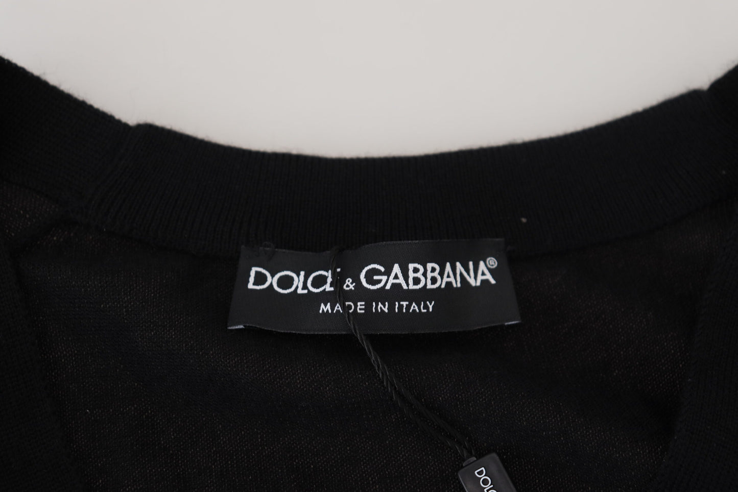 Pull en cachemire noir à boutons de Dolce & Gabbana
