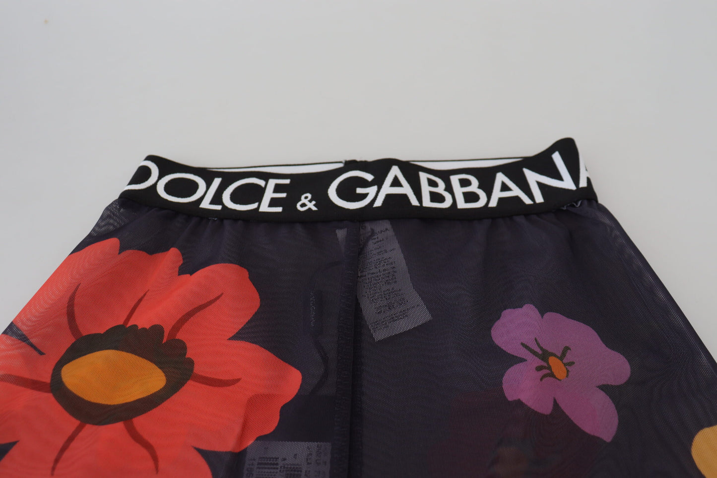 Dolce & Gabbana zwarte leggings met bloemenprint en elastische taille.
