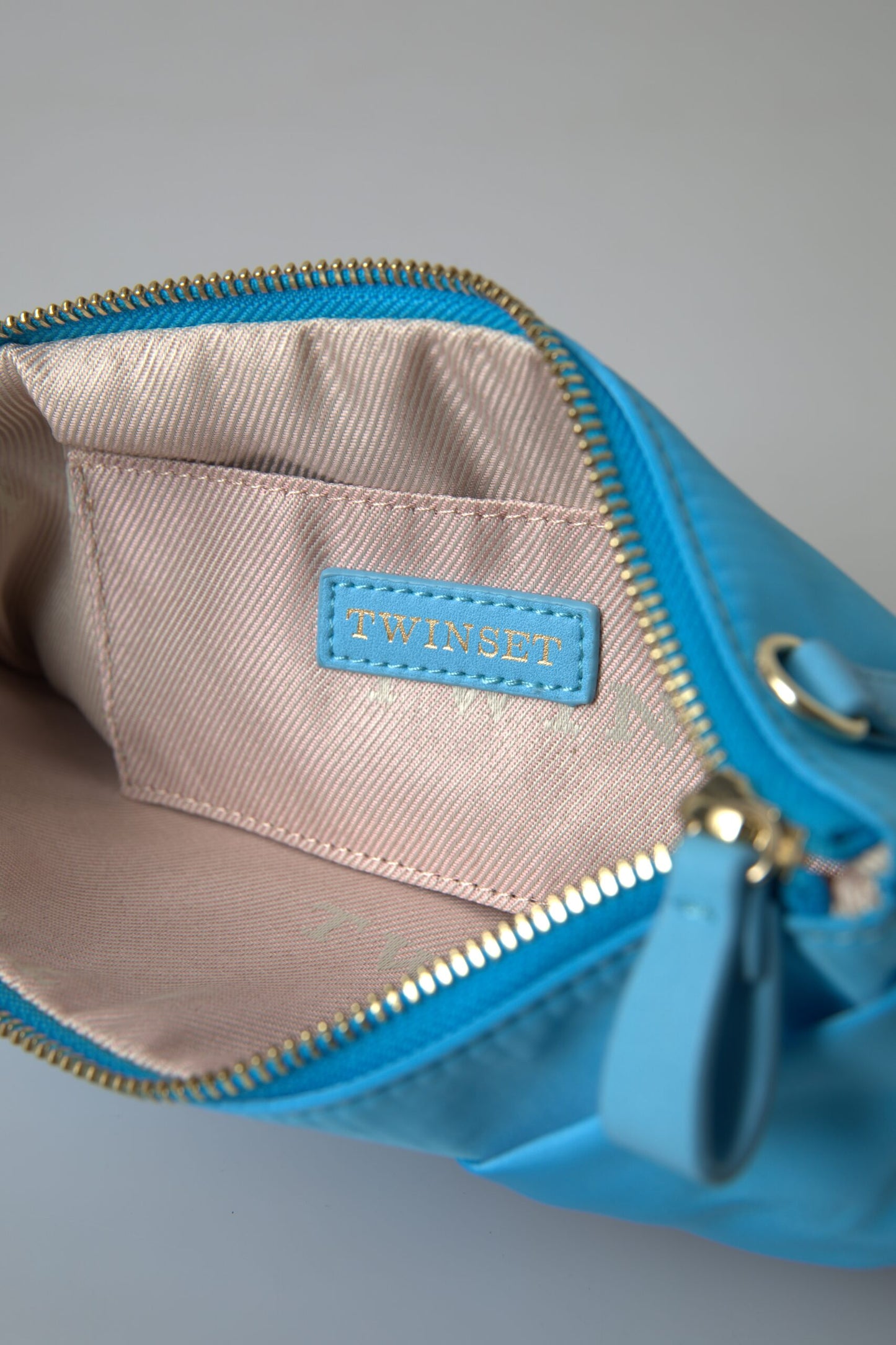 Pochette Twinset en tafta bleu et soie avec grand nœud et fermeture éclair pour femme, sac à logo Borse