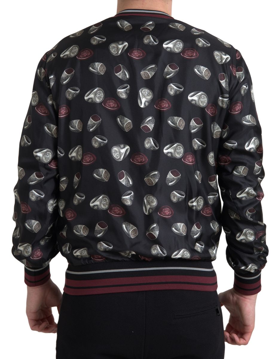 Dolce & Gabbana Zwarte Crewneck Trui van Zijde met Ringmotief