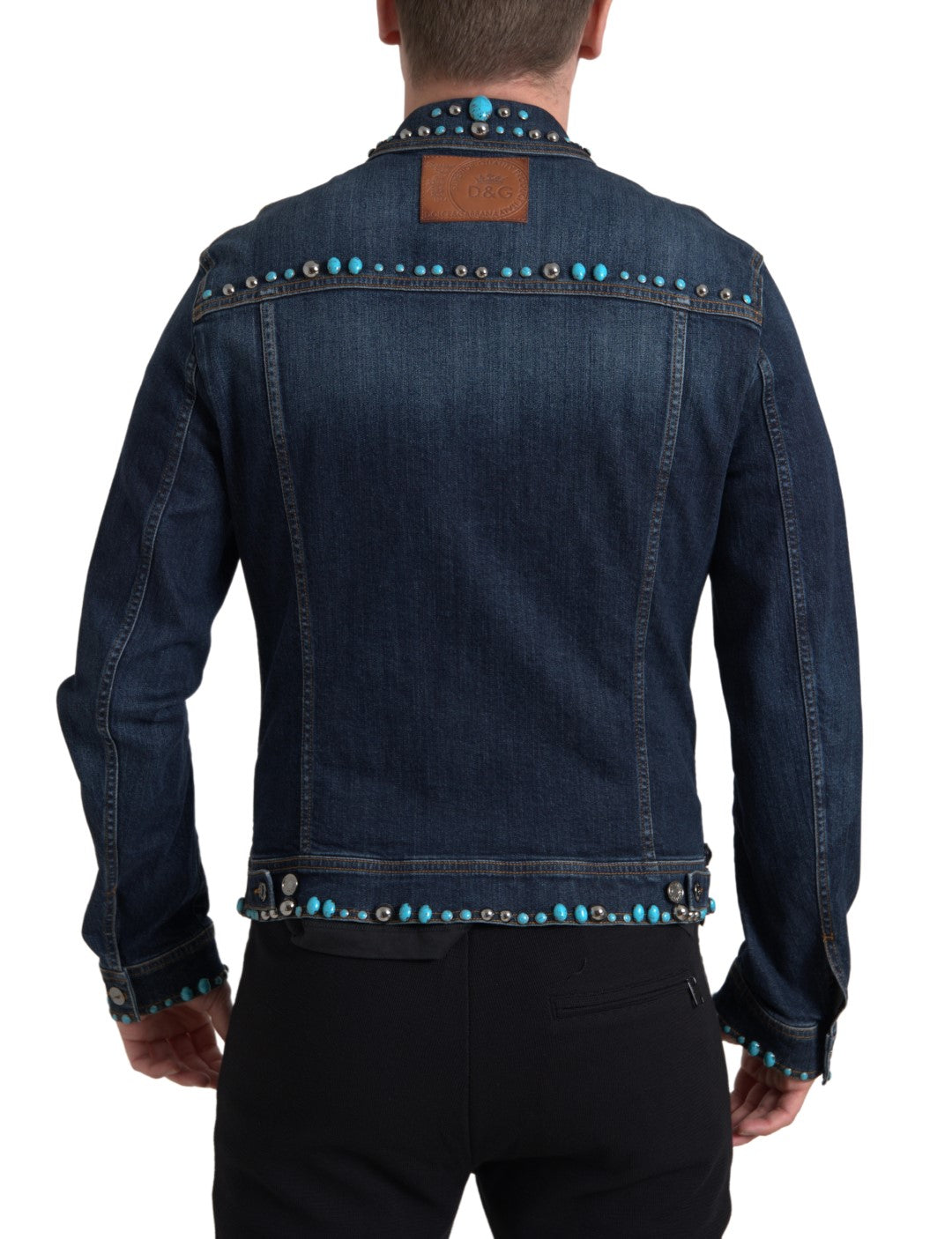 Dolce & Gabbana, veste en jean bleu, ornements turquoise et pierres cloutées.