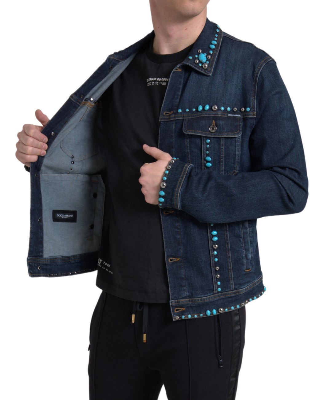 Dolce & Gabbana, veste en jean bleu, ornements turquoise et pierres cloutées.