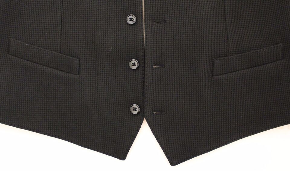 Veste-blazer Dolce & Gabbana en coton noir, type gilet-robe.