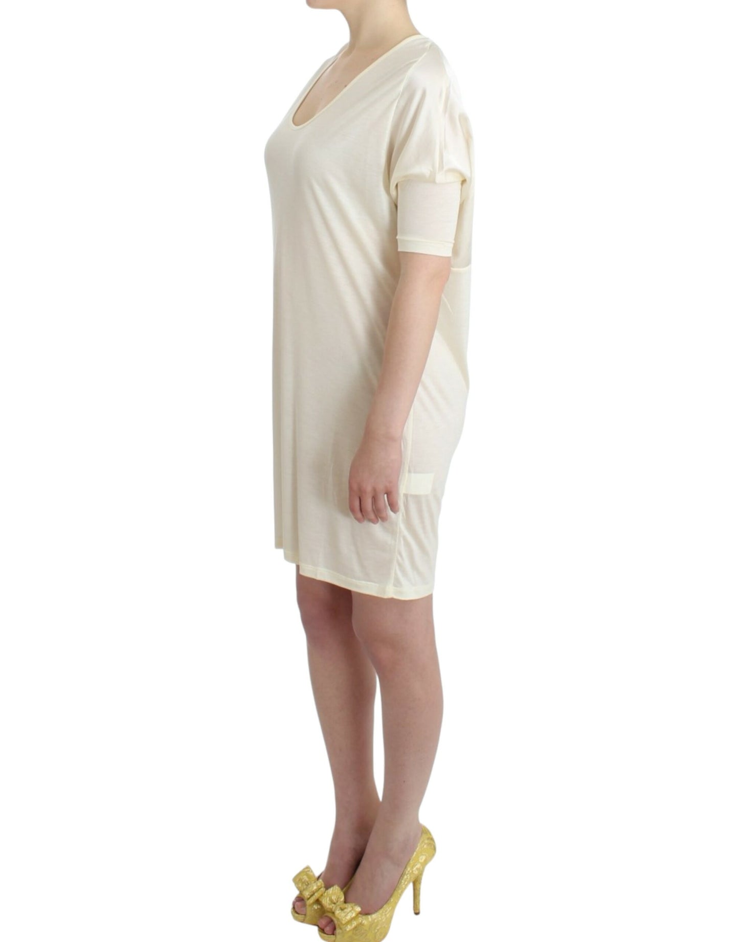 Costume National witte, mouwloze, rechte jurk van modal.