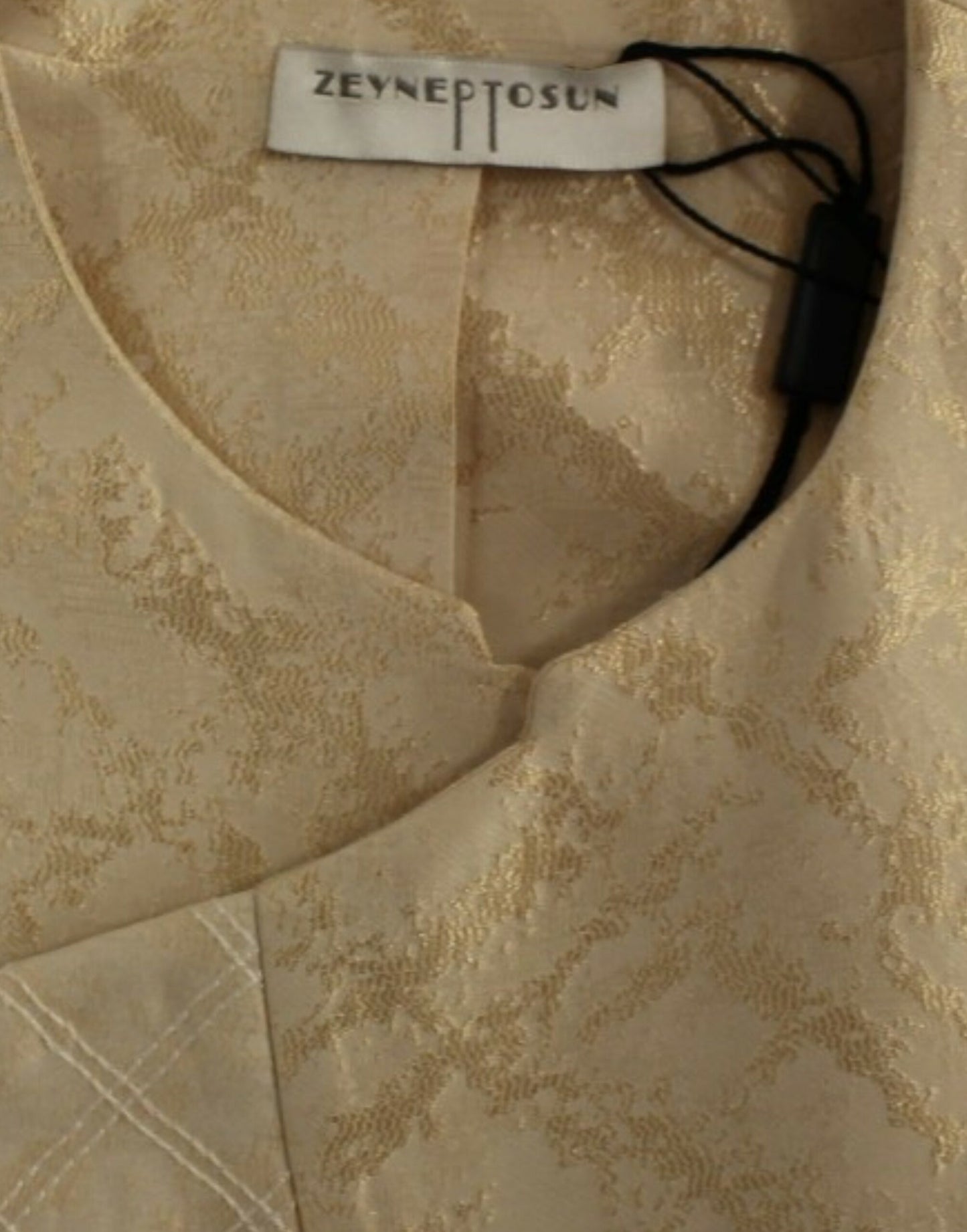 Veste sans manches en brocart beige de Zeyneptosun