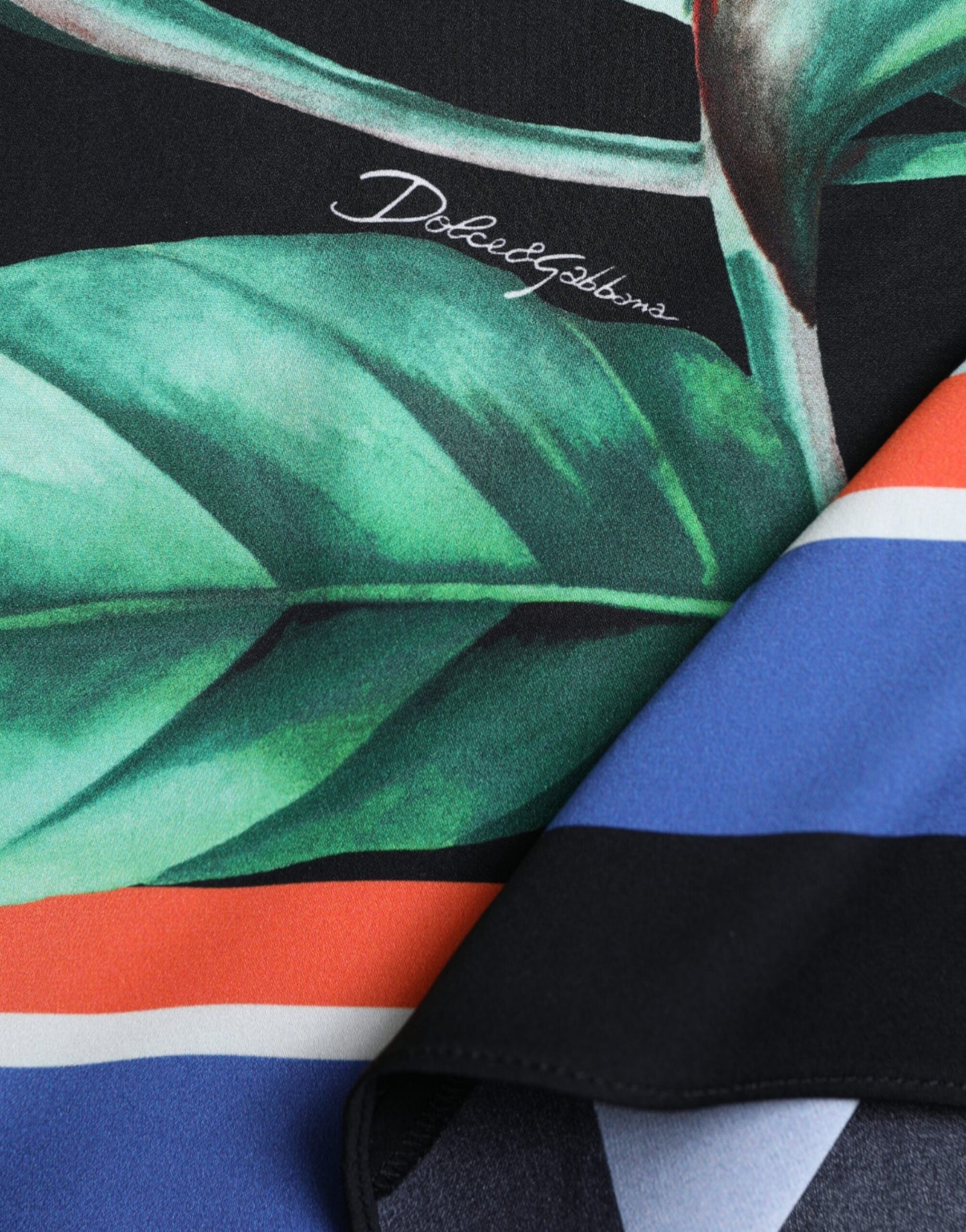 Dolce & Gabbana Zwarte Strelitzia Midirok met Hoge Taille en Overlappende Sluiting