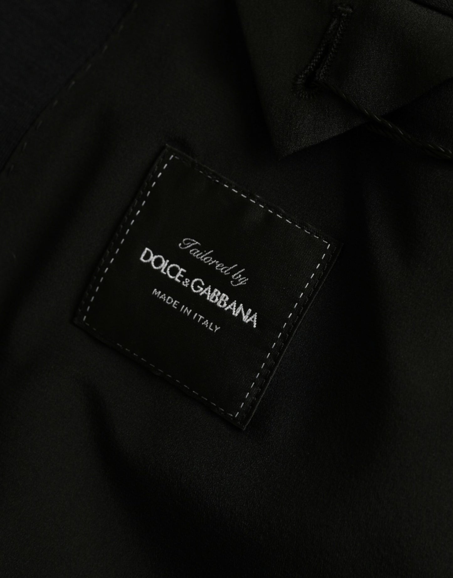 Dolce & Gabbana, blazer noir en laine, col à revers, à simple boutonnage.