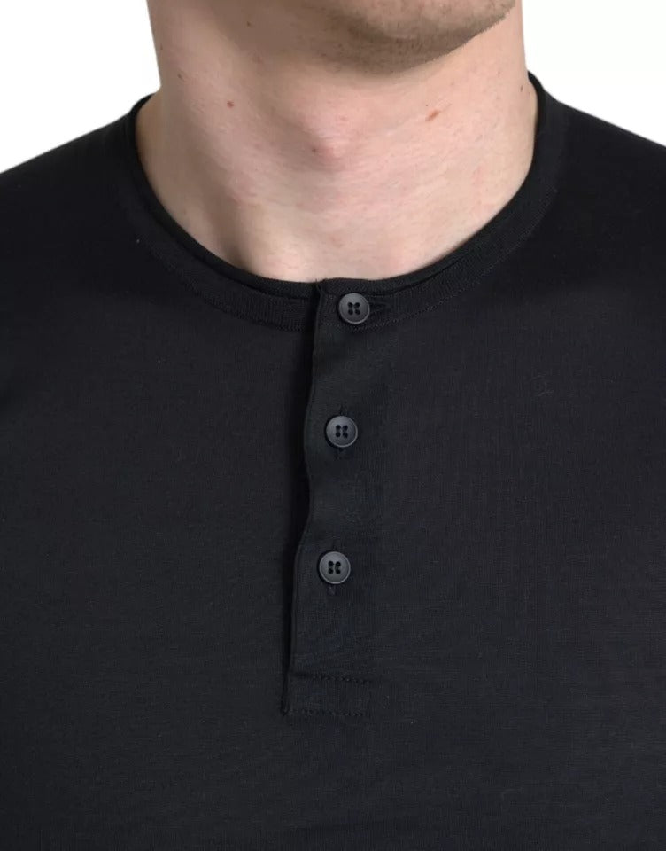 Dolce & Gabbana zwart T-shirt met ronde hals, korte mouwen en knopen.