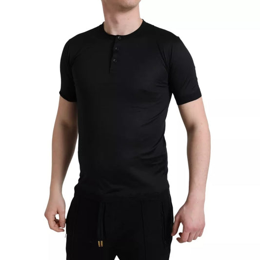 Dolce & Gabbana zwart T-shirt met ronde hals, korte mouwen en knopen.