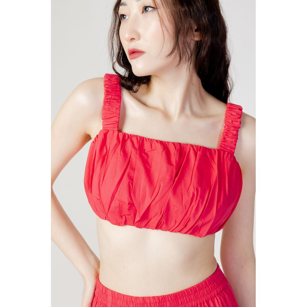 Seul le haut en coton orange.
