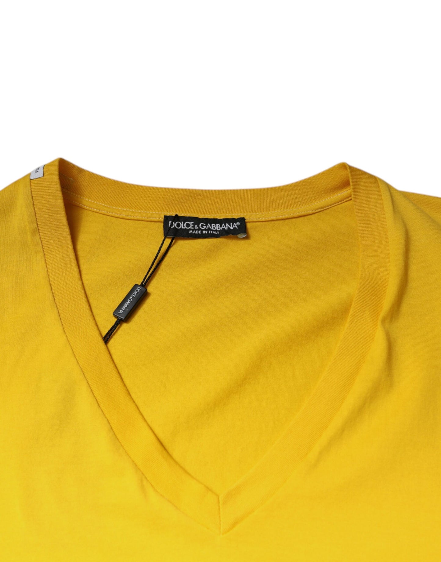 T-shirt Dolce & Gabbana en coton jaune, col en V, manches courtes.