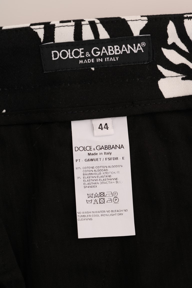 Dolce & Gabbana witte en zwarte katoenen stretch slim fit broek met bladmotief