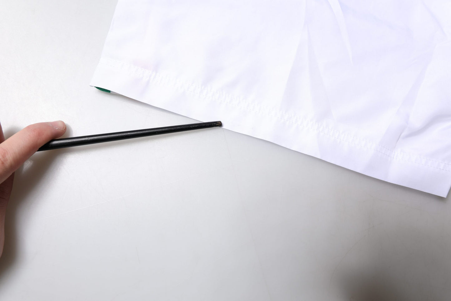 Short de bain rayé blanc Dolce & Gabbana, ensemble 2 pièces.