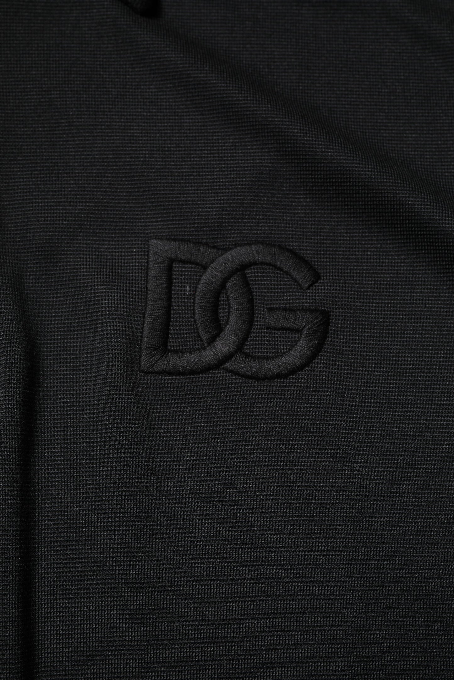 Polo en polyester noir avec col et logo DG de Dolce & Gabbana