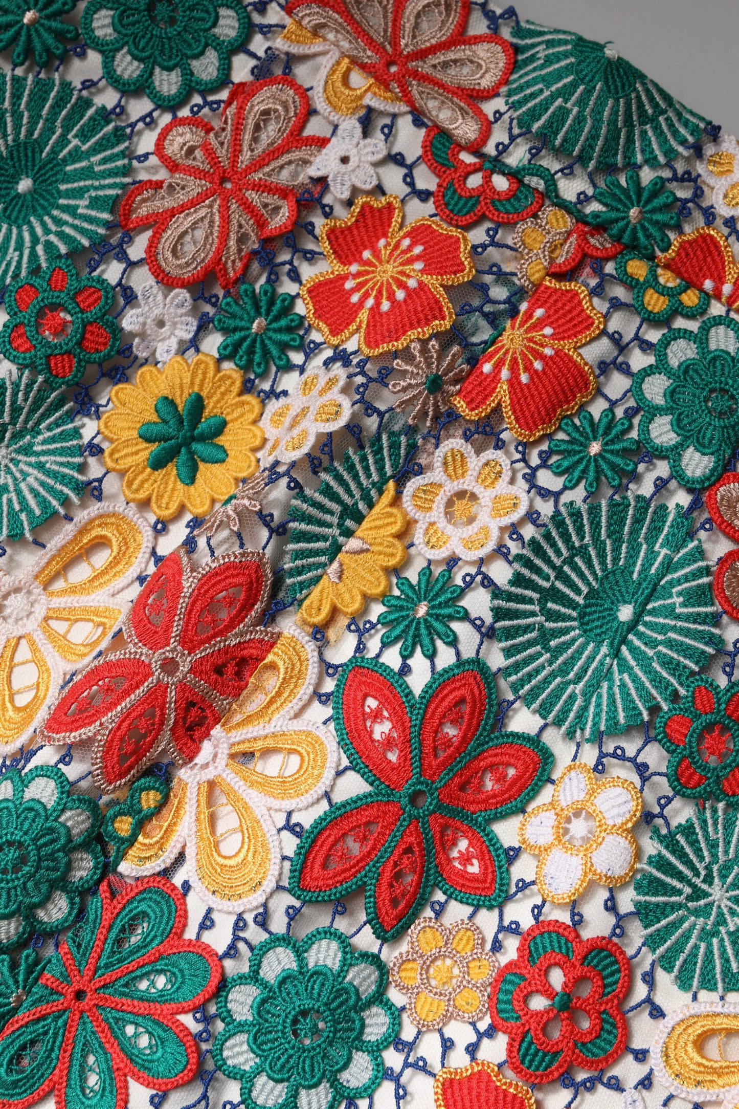 Jupe mini en dentelle florale multicolore à taille haute de Dolce & Gabbana