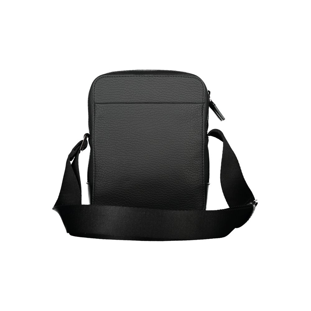 Calvin Klein Strakke Zwarte Schoudertas met Contrasterende Details
