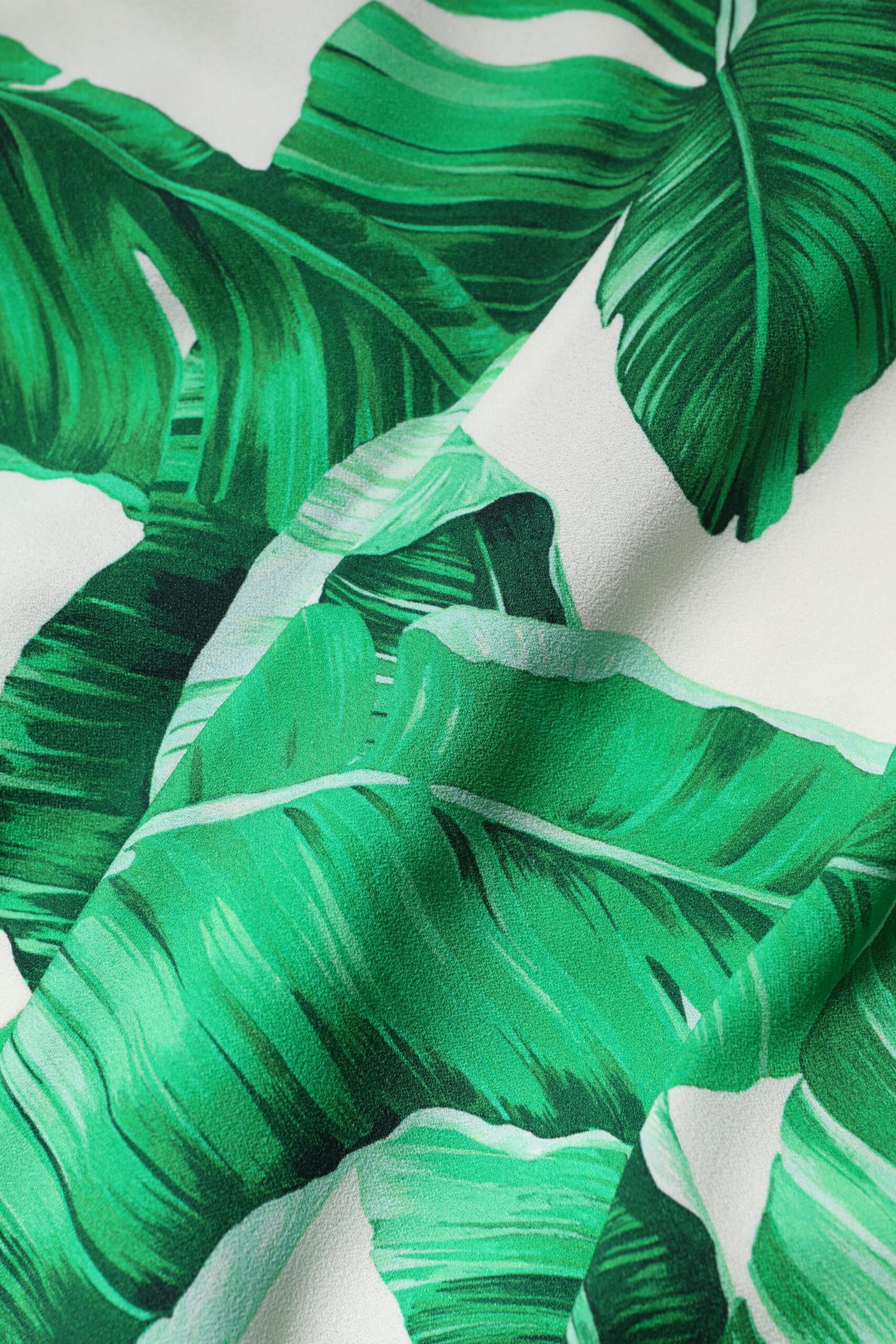 Pantalon taille haute blanc à feuilles vertes de Dolce & Gabbana