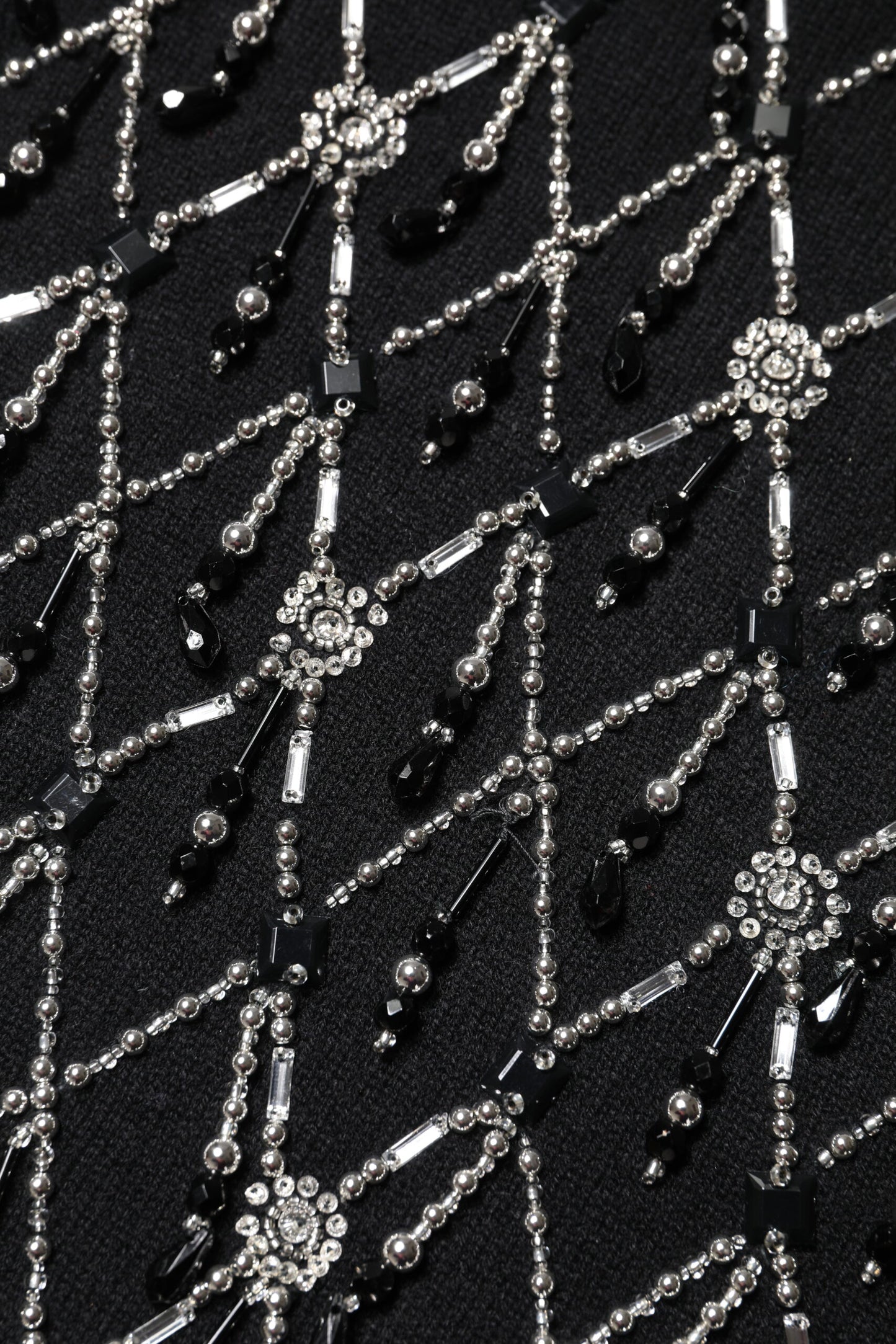 Dolce & Gabbana zwarte, met pailletten versierde top met lange mouwen van kasjmier