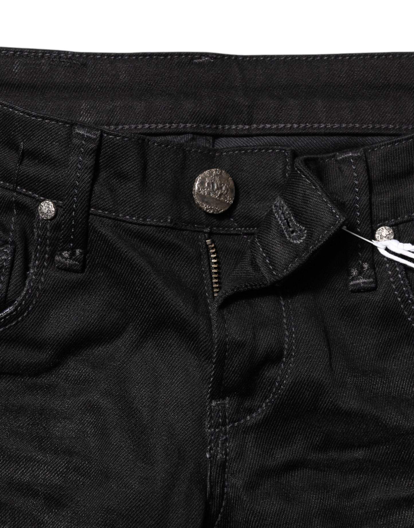 Acht zwarte katoenen slim fit denim jeans met lage taille.