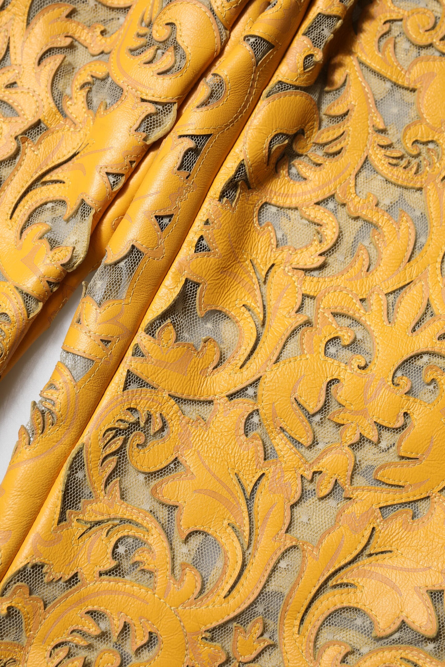 Pantalon capri taille mi-hauteur en dentelle à motifs floraux jaunes de Dolce & Gabbana