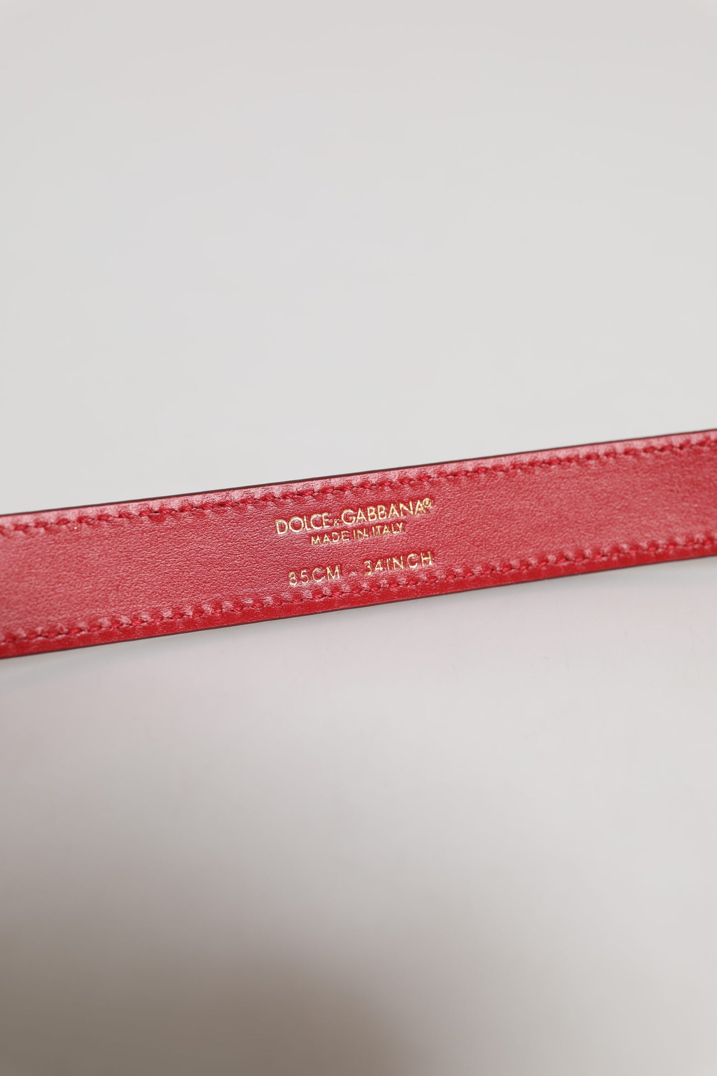 Ceinture à boucle en métal gravée du logo rouge Dolce & Gabbana
