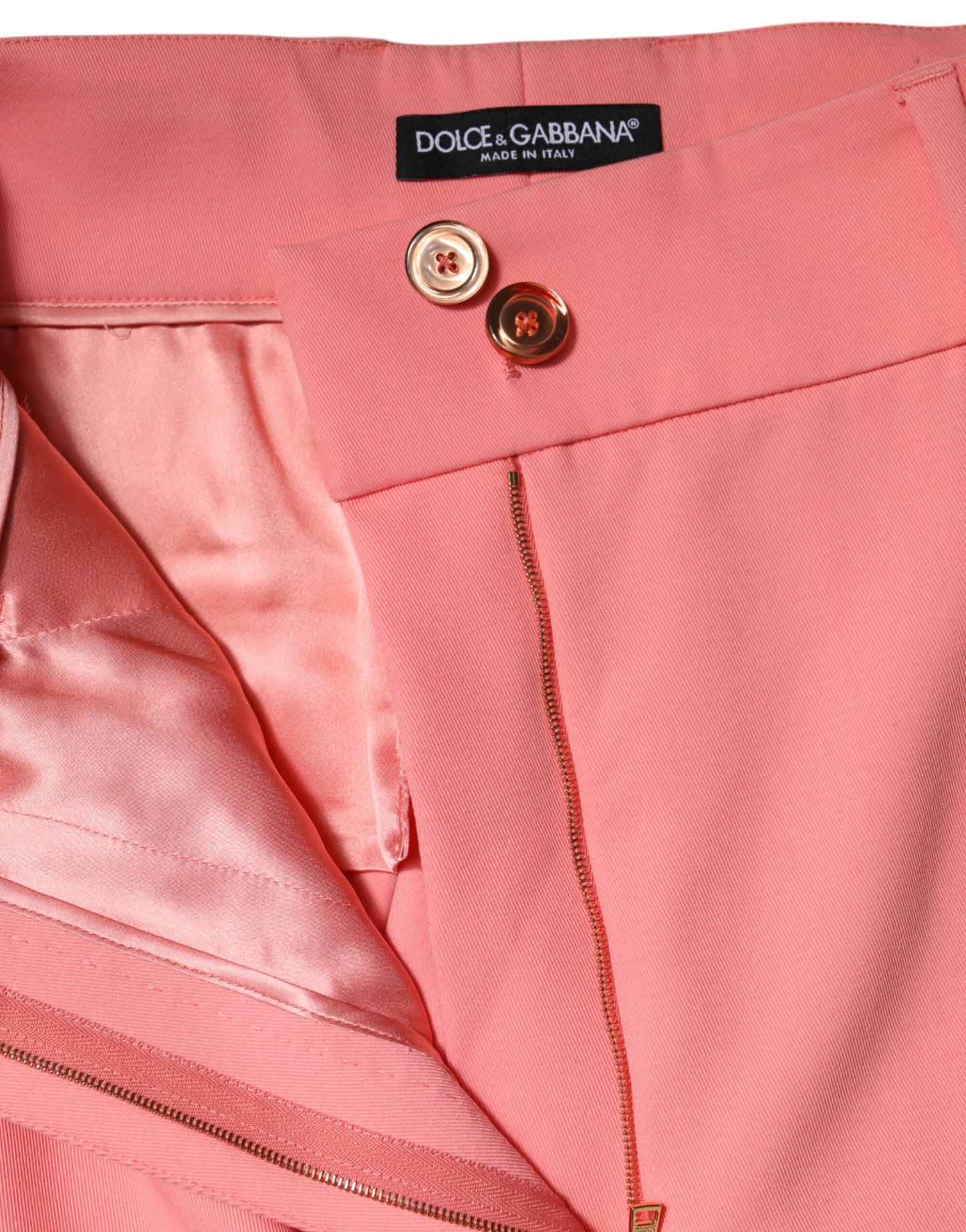 Dolce & Gabbana roze, taps toelopende broek met hoge taille.
